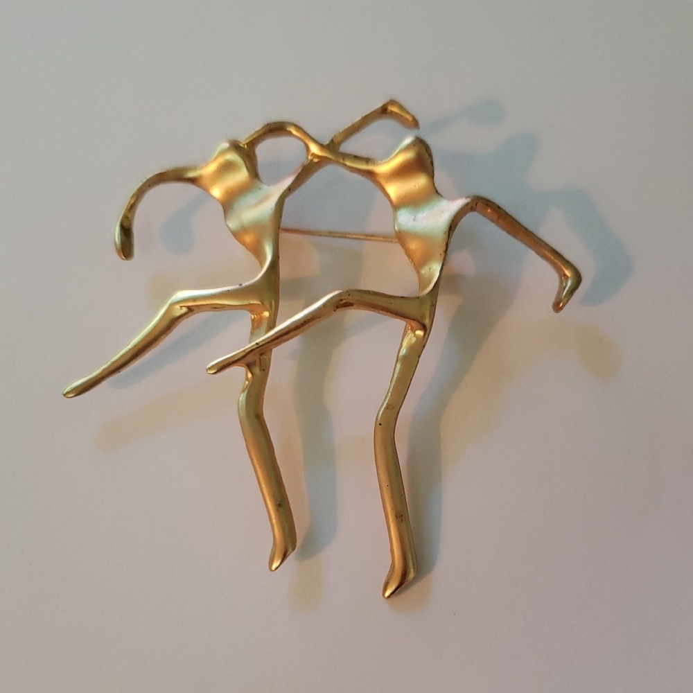 Vintage Modern Dance Figural Brooch in Matte Gold Metal 1980s by A.J.C.